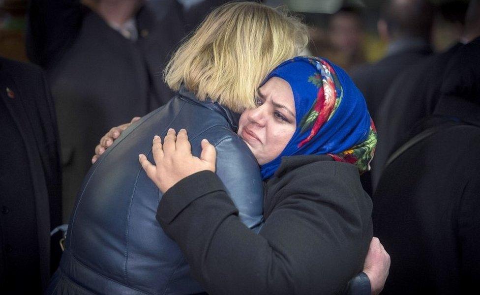 Anila Mushtaq hugging woman