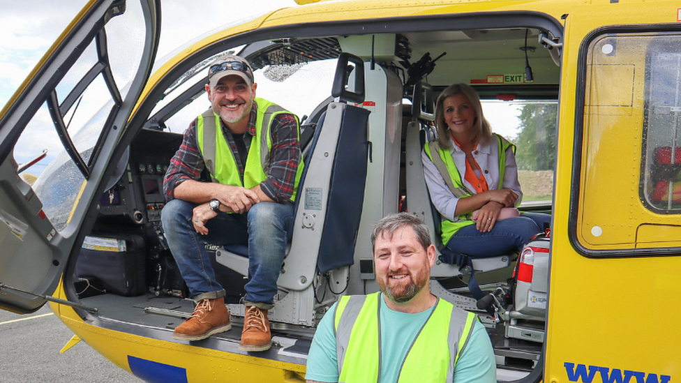 Robert Beck and Jane Danson in the air ambulance with friend Chris