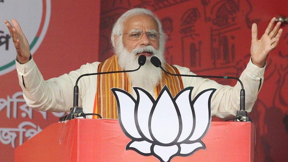 Indian Prime Minister Narendra Modi deliver his speech to the supporters of Bharatiya Janata Party (BJP) during a mega rally ahead of the state legislative assembly elections in Barasat, North 24 Pargana district outskirts of Kolkata, India on 12th April, 2021.