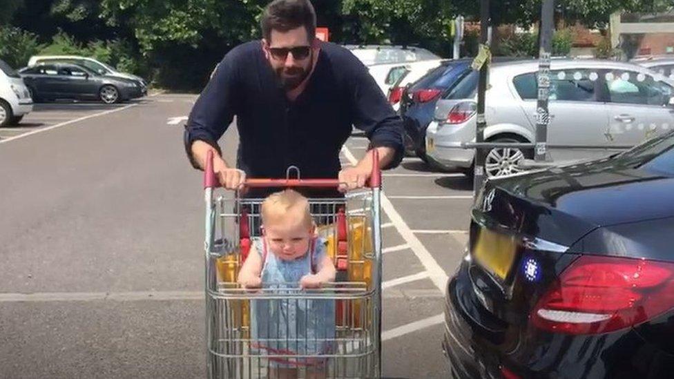 Gareth Wild with daughter in trolley