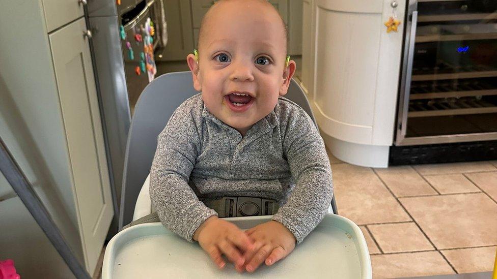 Luca in his highchair