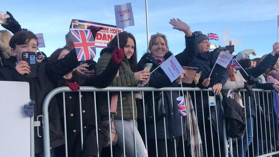 Families in Devonport at the homecoming of HMS Montrose