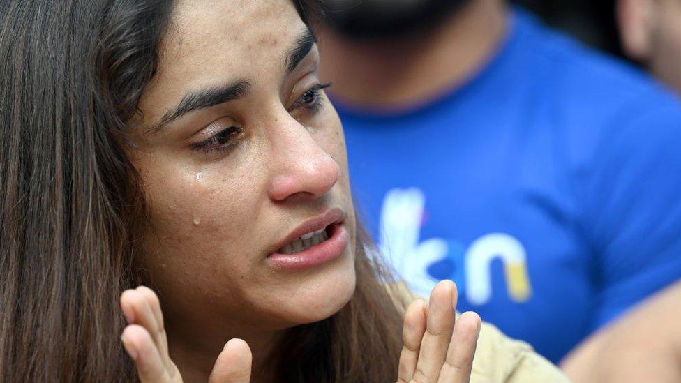 Wrestler Vinesh Phogat breaks down while addressing a press conference during their protest against the Wrestling Federation of India at Jantar Mantar, on April 23, 2023 in New Delhi, India.