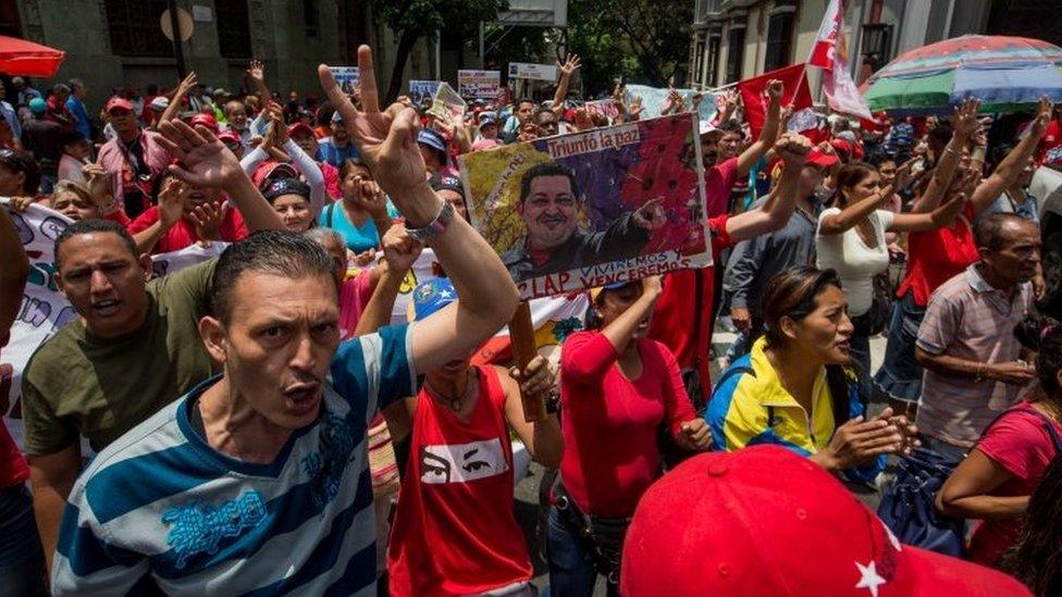 A group of supporters of the Venezuelan Government rally during the commemoration activities of the failed state coup held against late Venezuelan President Hugo Chavez on 11 April 2002, Caracas, Venezuela, on 11 April 2017.