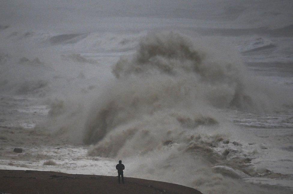 Waves crash on to the beach and cliffs, on November 02, 2023 in West Bay, Dorset.