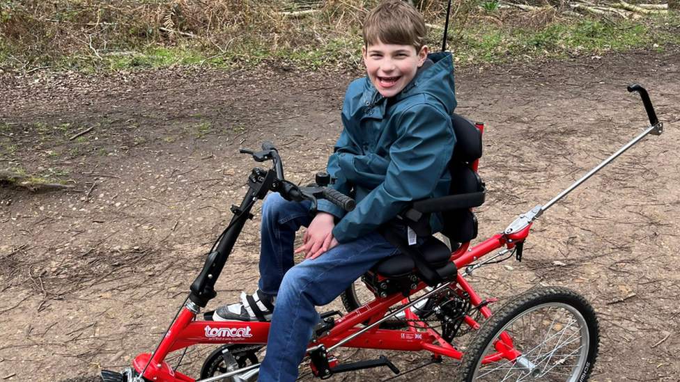 Specially adapted trike a gamechanger for disabled Henry BBC News