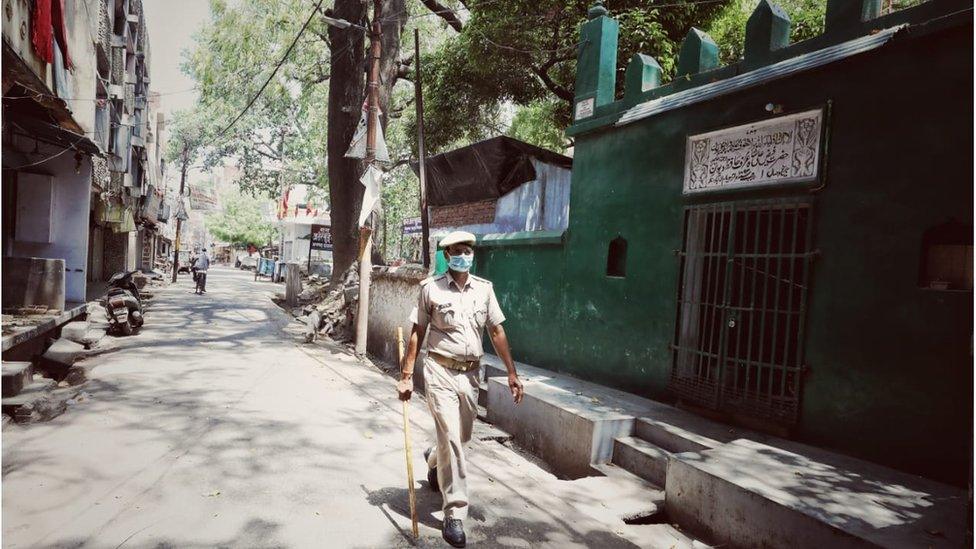 Policemen patrol street stay vigilant in the night as well