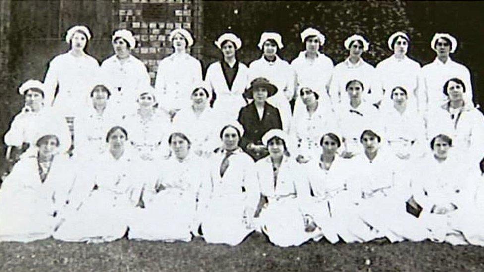 Dorothée Pullinger (centre in black), with some of her factory workers