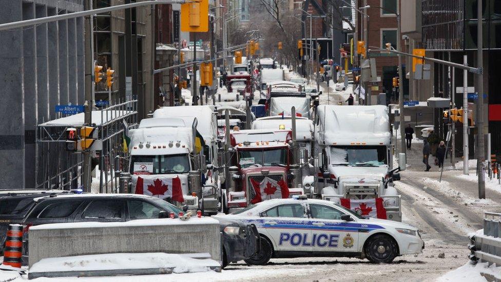 Trucks and a police barricade in Ottawa