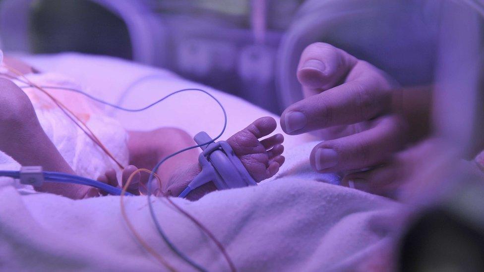 A baby in an incubator in the Intensive Care Nursery in the newly built Women's Centre at the Royal Gloucestershire Hospital 03/11/2011.