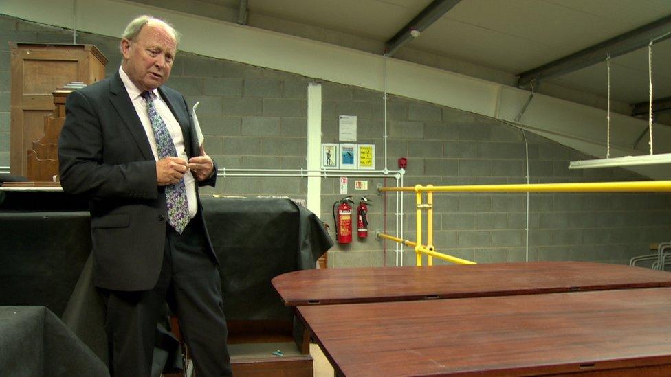 Jim Allister stands next to a table on which the Act of Union may have been drafted