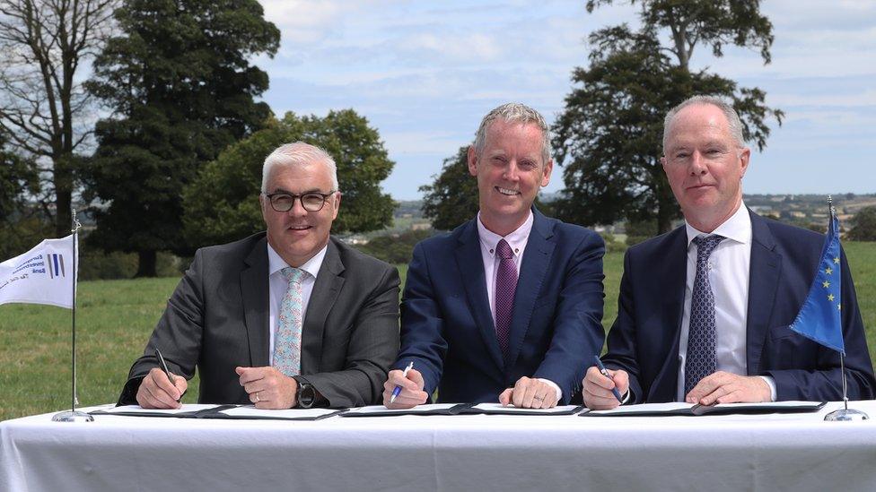 Richard Kennedy, group CEO at Devenish, Andrew McDowell, Vice President of the European Investment Bank and Owen Brennan, chairman of Devenish