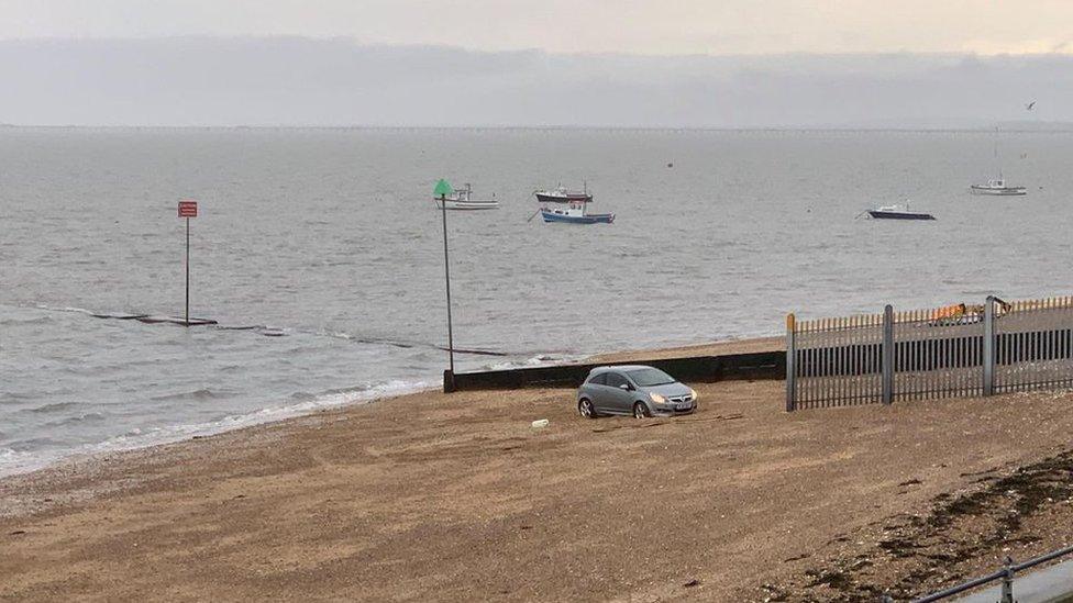 Car stuck on beach