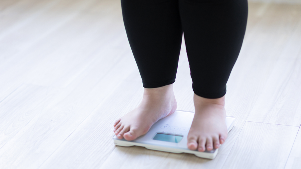 Woman on scales