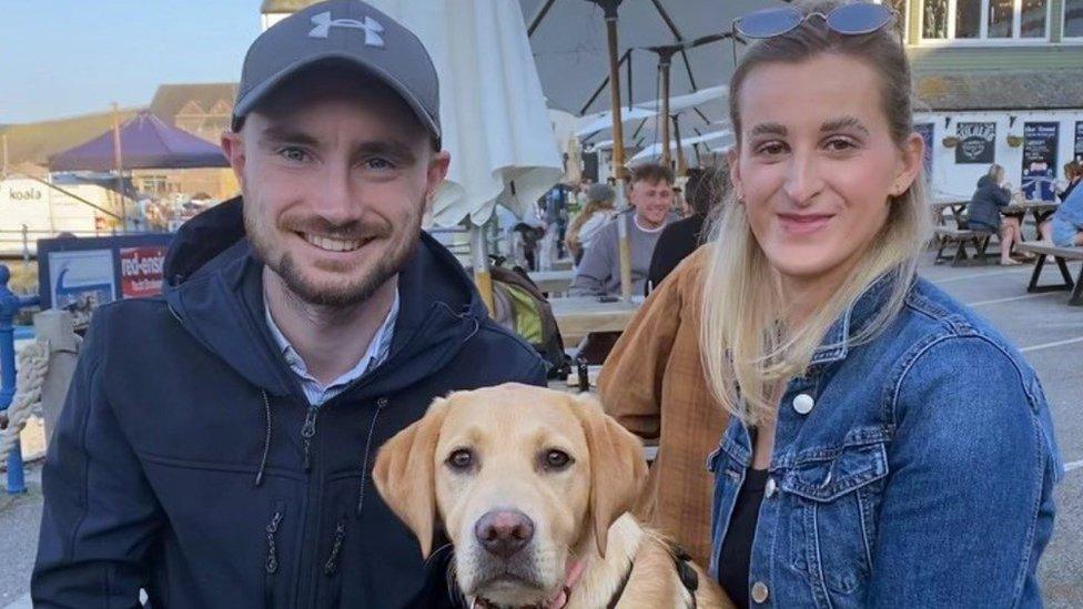 Tom Perry and wife Ella with their dog