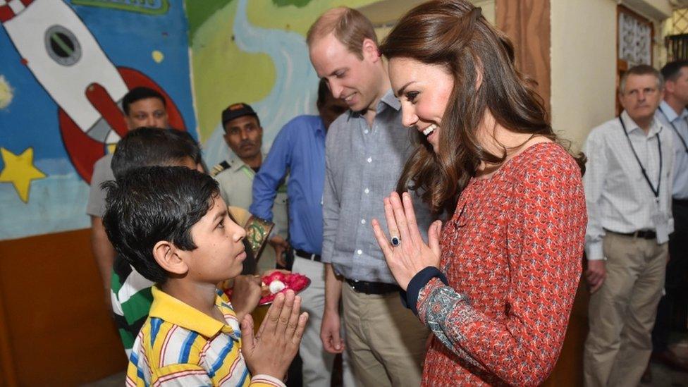 The Duke and Duchess of Cambridge with street children