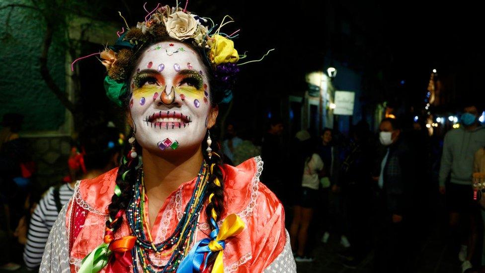 Woman dressed as Catrina, a figure of Day of the Dead