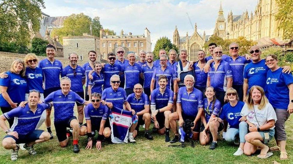 Cyclists stood in London