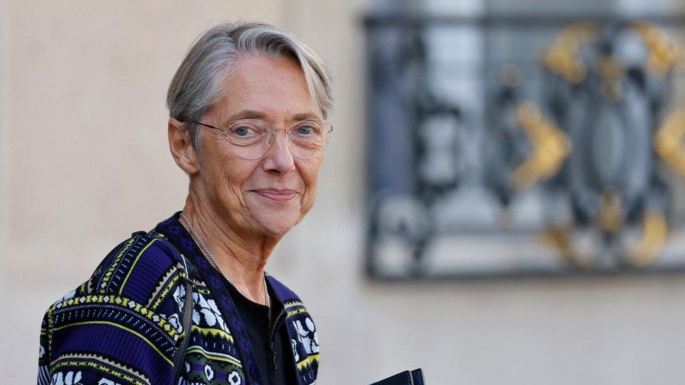 France's Prime Minister Elisabeth Borne leaves after the weekly cabinet meeting at the presidential Elysee Palace in Paris on October 12, 2022.