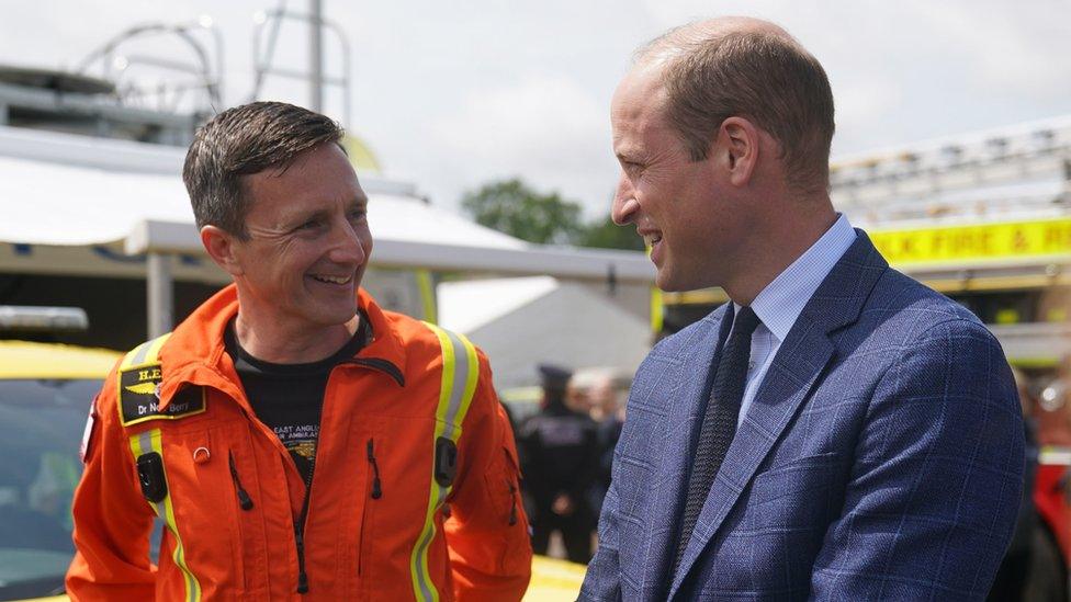 Prince William talking to Dr Neil Berry, a former Air Ambulance colleague