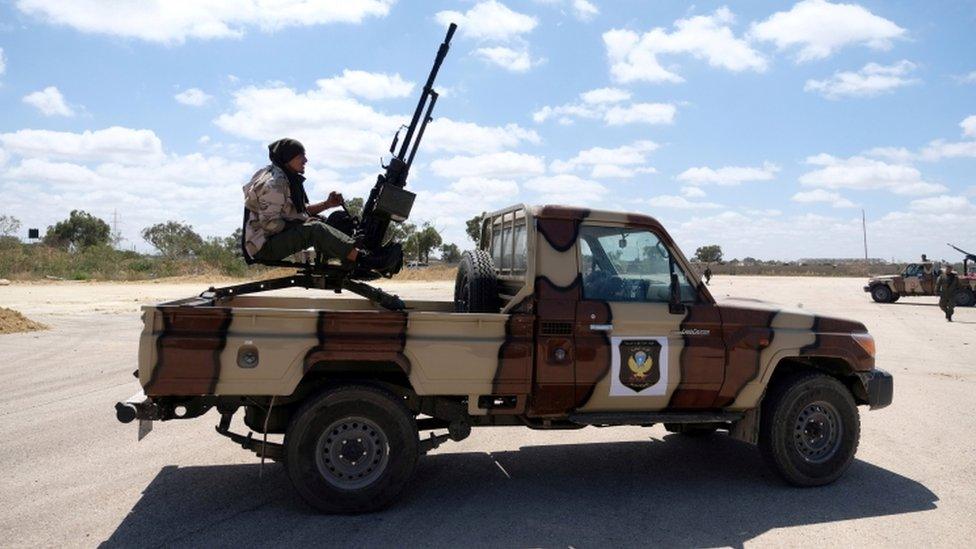 A member of Libyan National Army (LNA), commanded by Khalifa Haftar, is seen as he heads out of Benghazi