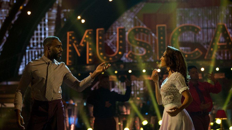 Charles Venn dances with his partner Karen Clifton