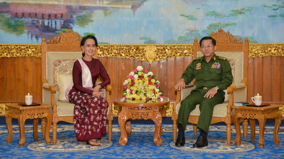 Aung San Suu Kyi seated alongside the commander-in-chief of Myanmar's military, Senior General Min Aung Hlaing