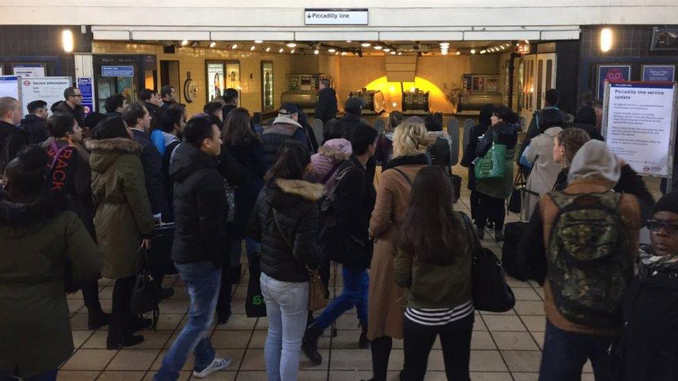 commuters at Turnpike Lane tube station