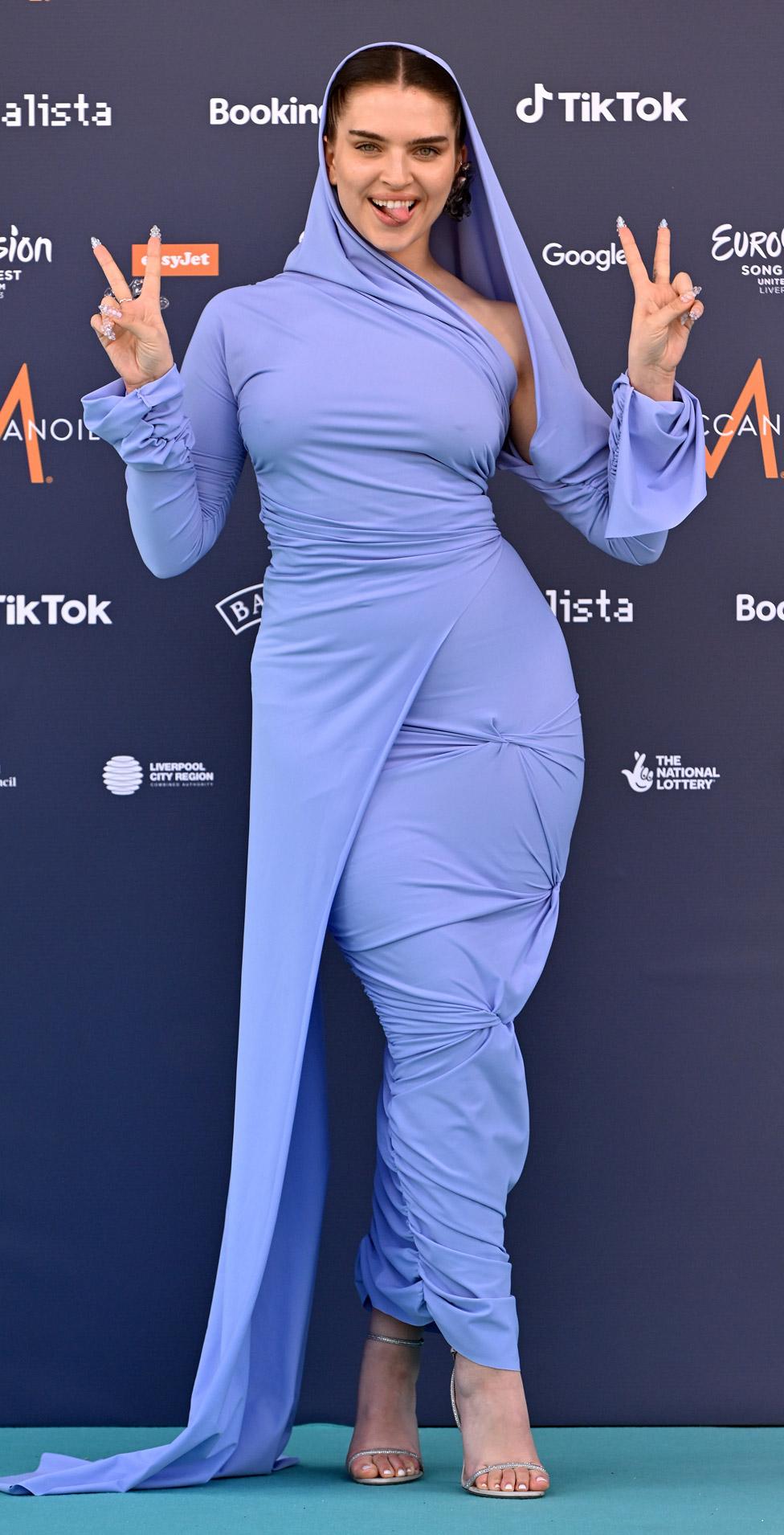 Mae Muller on the Eurovision turquoise carpet in Liverpool