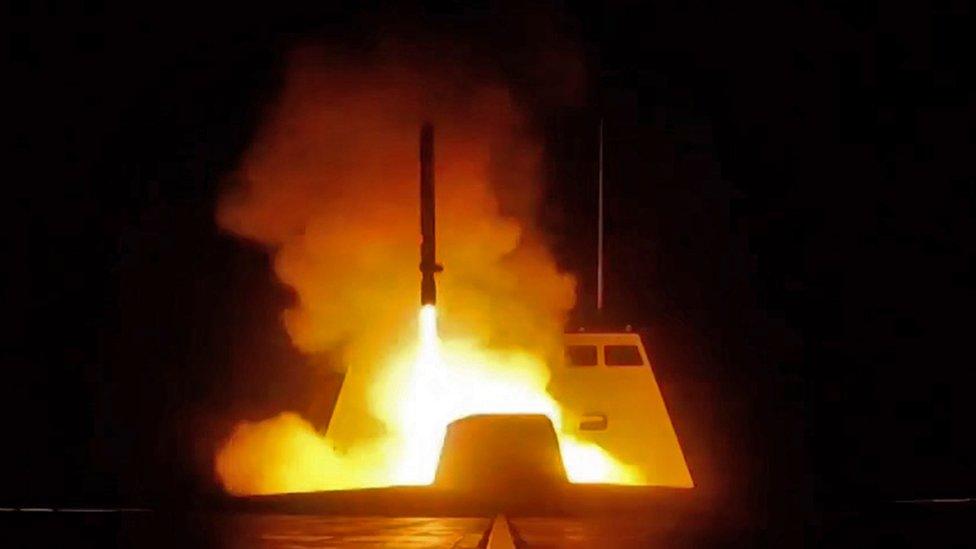 A picture released by the French Defence audiovisual communication and production unit (ECPAD) shows the launching of a cruise missile from a French military vessel in the Mediterranean sea towards targets in Syria overnight April 13 to 14, 2018.