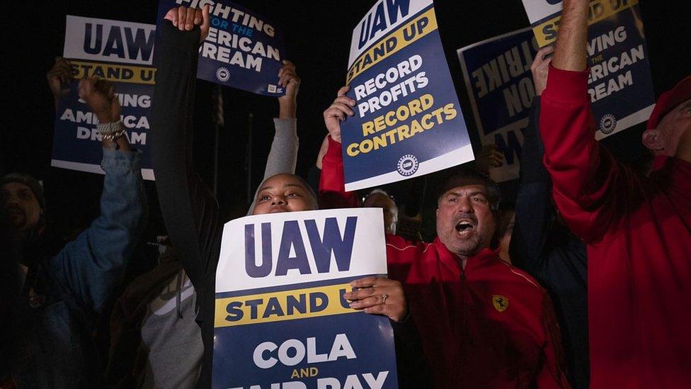 Supporters and workers cheer as United Auto Workers members go on strike at the Ford Michigan Assembly Plant