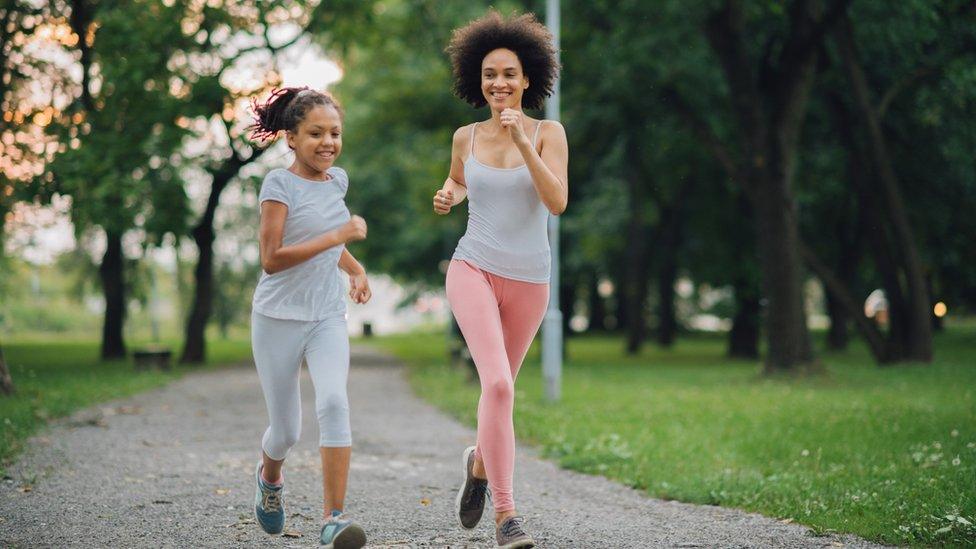 girls-running-in-park.