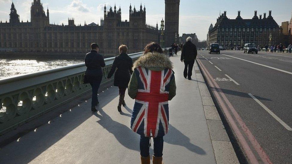 Passer-by on Westminster Bridge in central London