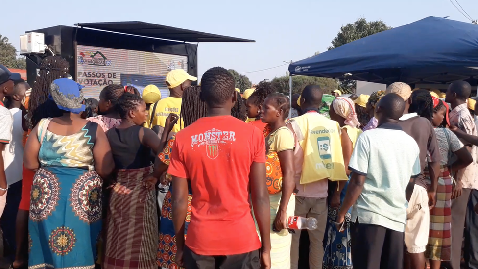 Crowd around the community tablet