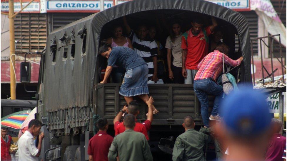 A Venezuelan military convoy transports a group of people for free in Maracaibo Venezuela on 19 July 2018.