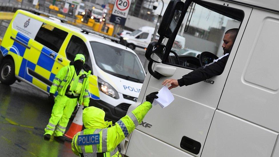 Police check lorry documentation at Dover