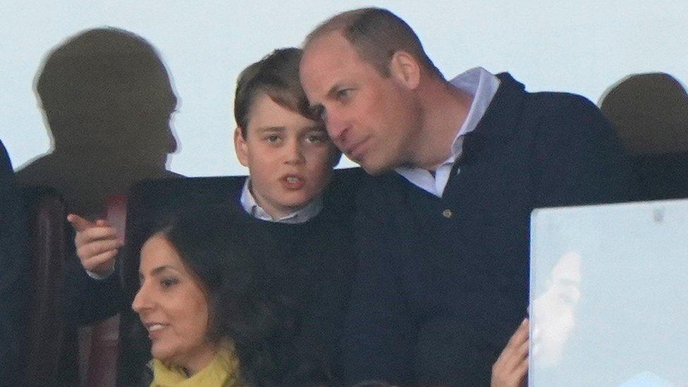 The Prince of Wales with Prince George of Wales before the match