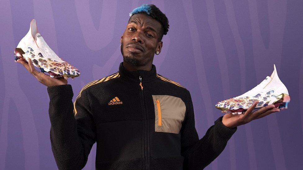 paul-pogba-holding-vegan-boots.