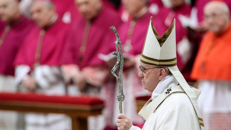 Pope Francis leads the midnight Christmas Mass in Saint Peter's Basilica at the Vatican City (24 December 2015)