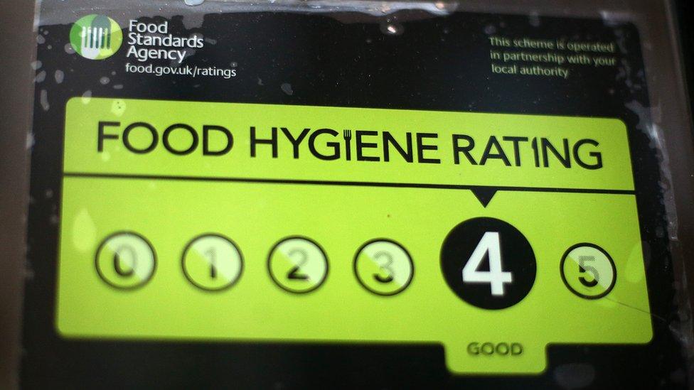 A Food Standards Agency rating certificate is pictured in the window of a restaurant on February 9, 2015 in London, England