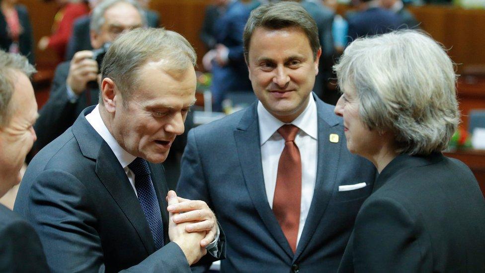 Theresa May chats to European Council president Donald Tusk (left) and Luxembourg's Prime Minister Xavier Bettel at the start of the summit