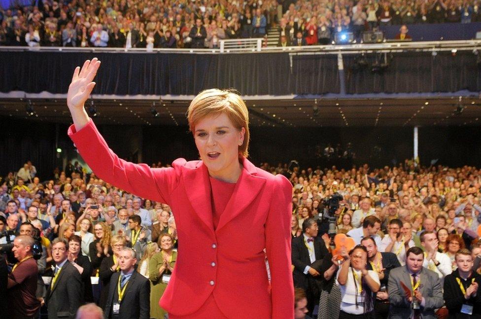 Nicola Sturgeon waves after delivering her keynote address to delegates at the SNP Conference in Glasgow, Scotland on October 15, 2016.