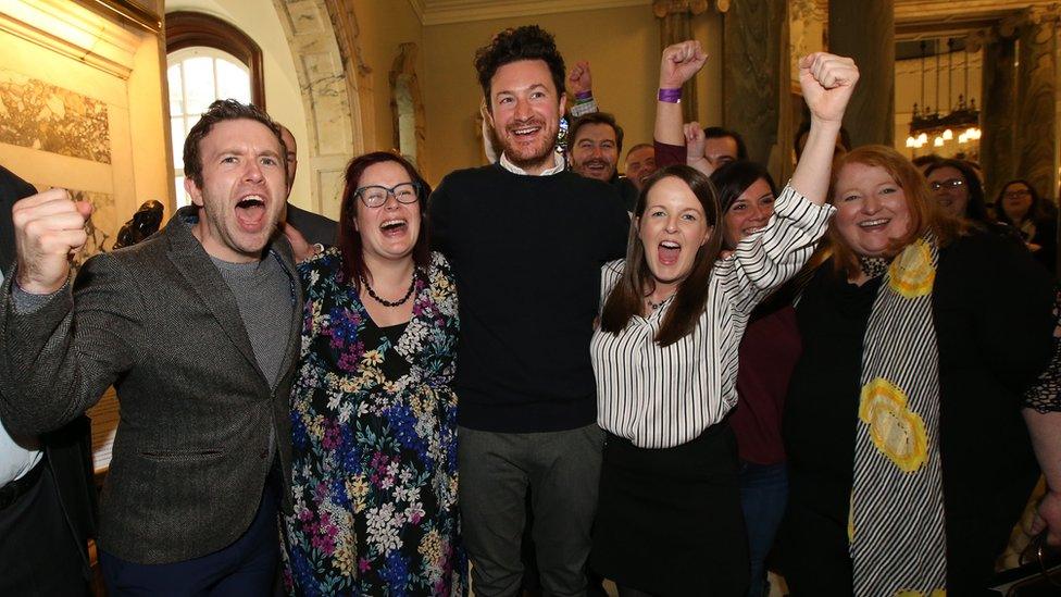 The Alliance Party celebrate in Belfast