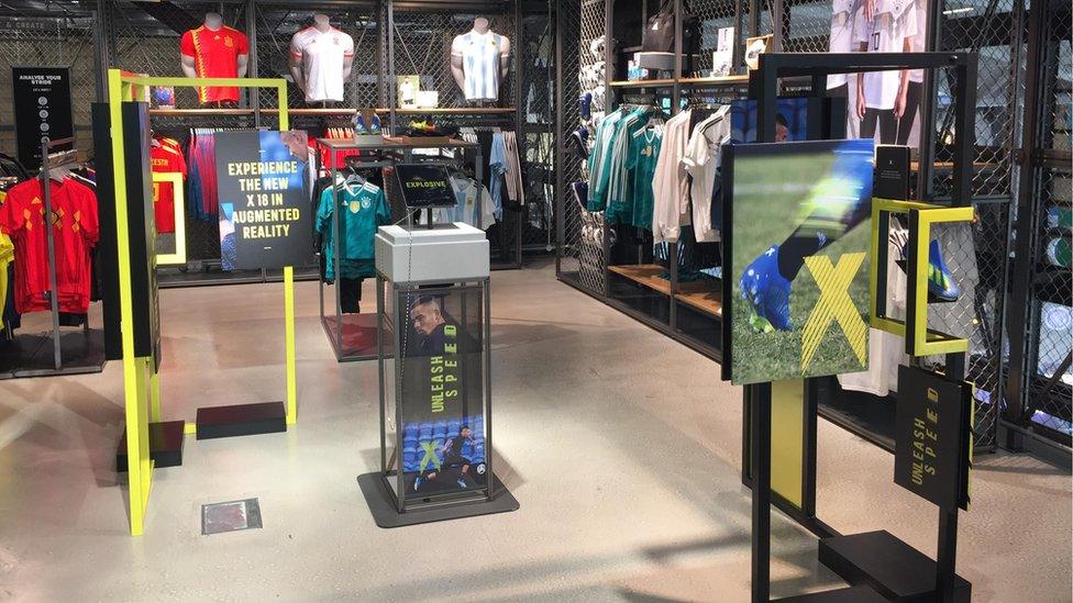 Adidas store with augmented reality promotion