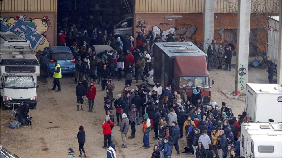 Officers break up an illegal party outside Barcelona in Spain