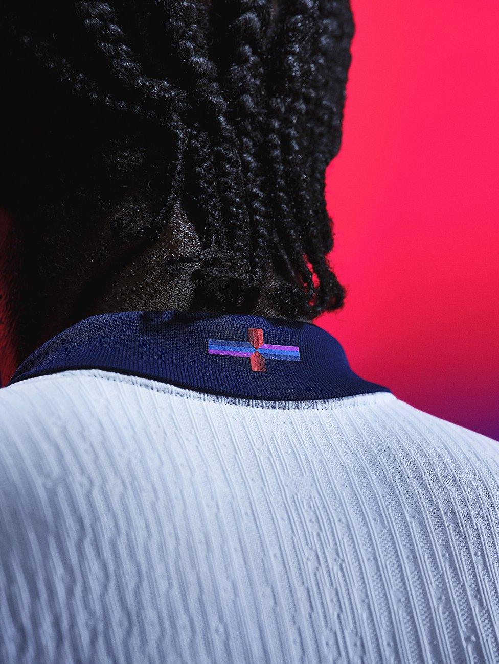 The back of Nike's new England shirt featuring a red, blue and purple St George's Cross on the collar