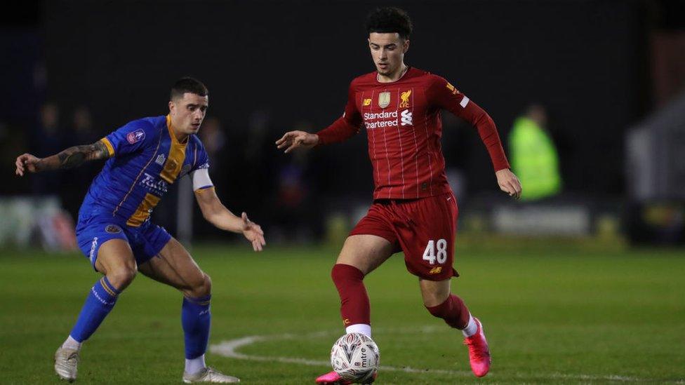 liverpool-and-shrewsbury-town-players.