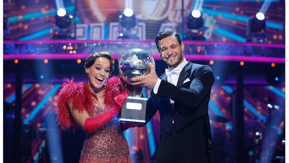 Ellie and Vito with the glitterball trophy