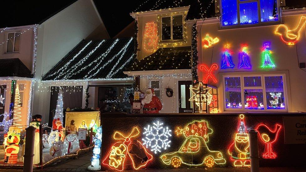 House covered in Christmas lights