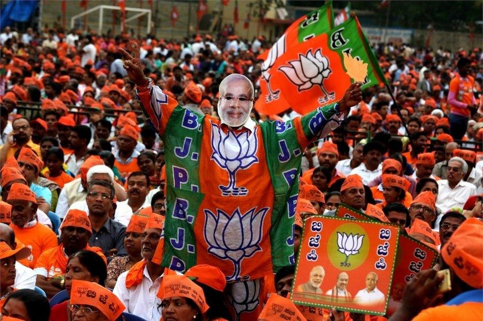 A general view showing BJP supporter wearing a mask of Indian Prime Minister Narendra Modi is seen during the Bhartya Janta Party (BJP) public rally meeting ahead of Karnataka Assembly Election, in Bangalore, India, 08 May 2018.